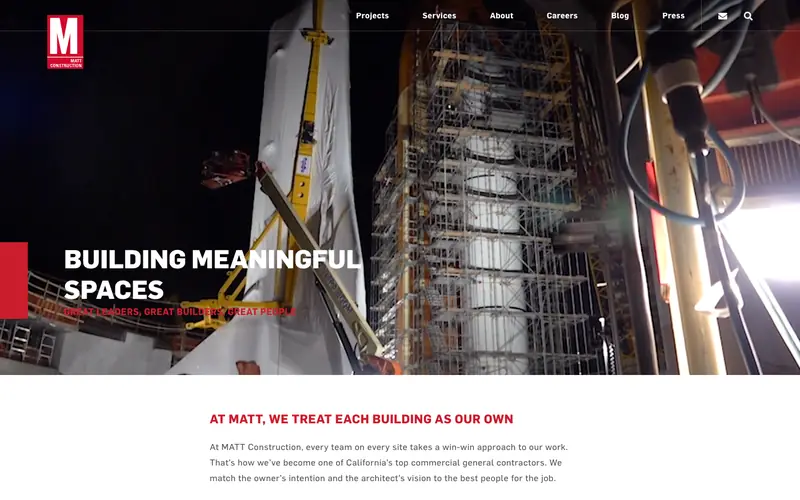 The MATT Construction homepage with scaffolding around a tall structure