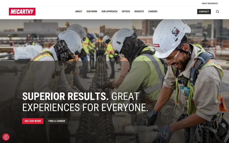 The McCarthy homepage with a crew in hard hats laughing on site