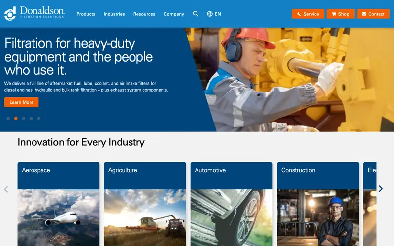 The Donaldson homepage with a technician in ear protection and orange Service, Shop and Contact buttons