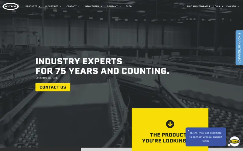 The Hytrol homepage with a dark warehouse photo, a yellow Contact Us button and a Find an Integrator tab
