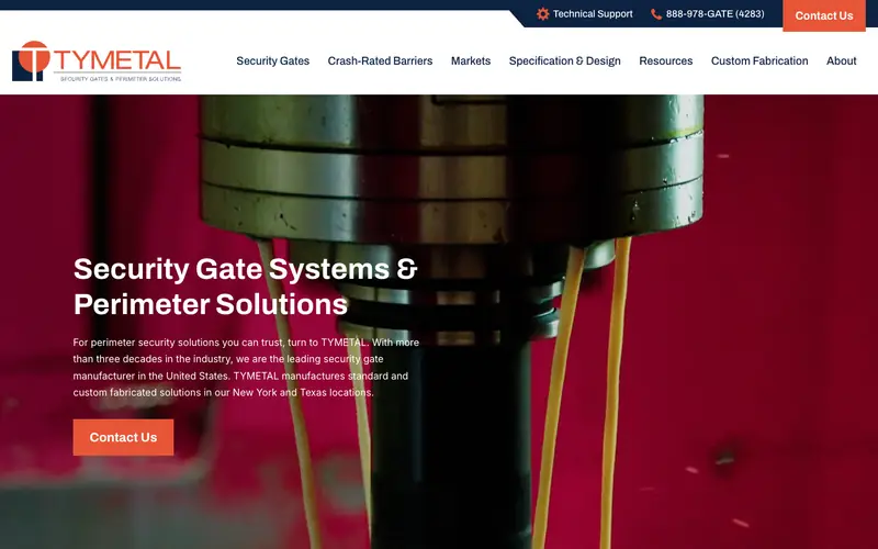 The TYMETAL homepage with a drill press in red light and the headline Security Gate Systems and Perimeter Solutions